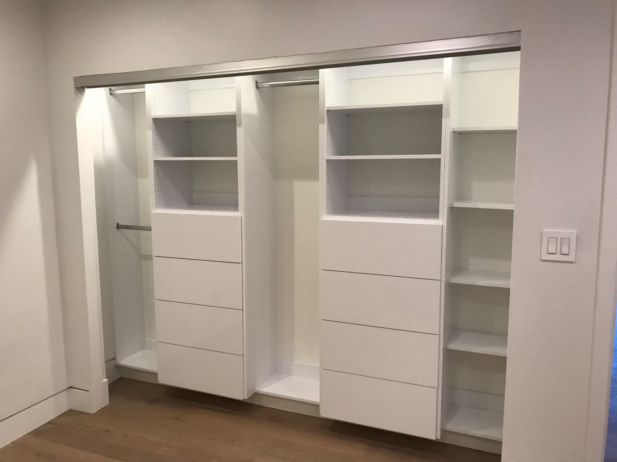 Custom white closet and storage system